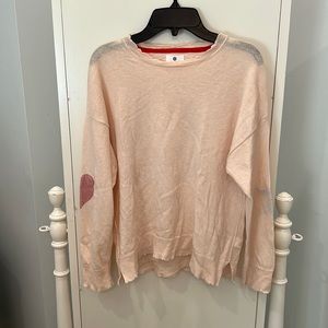 Pink sweater with elbow details